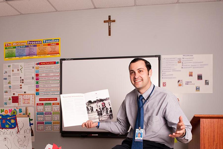 A Catholic school teacher at the head of the class.