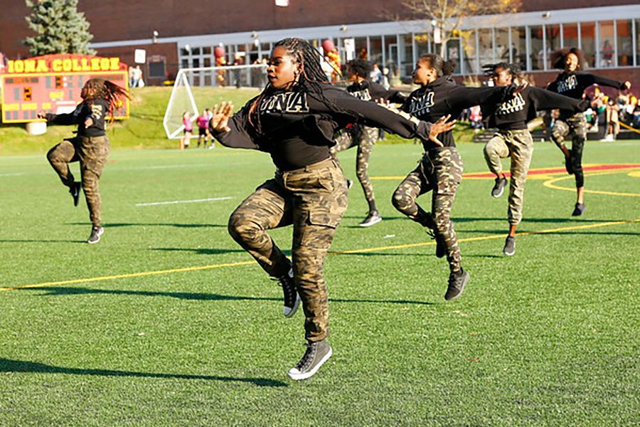 Members of the Black Student Union perform on Mazzella Field.