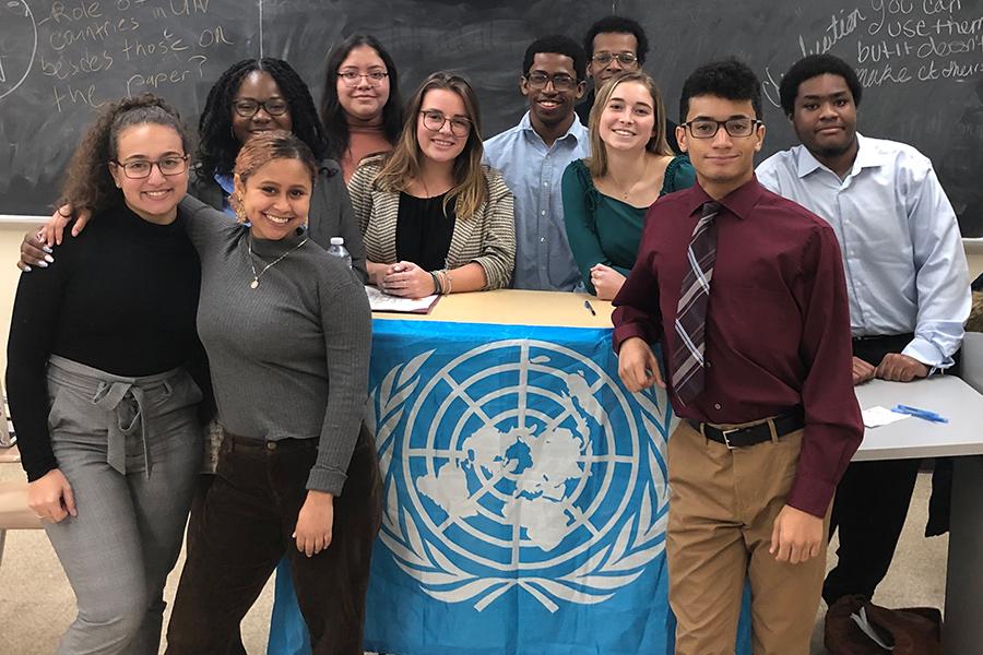 The Model UN club at one of their meetings.