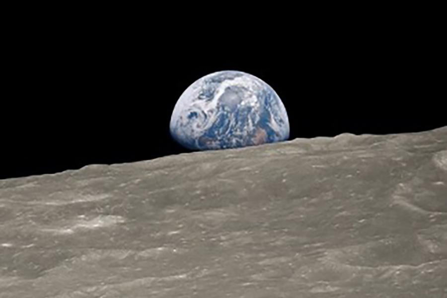 A picture of planet Earth from the perspective of the moon in space.