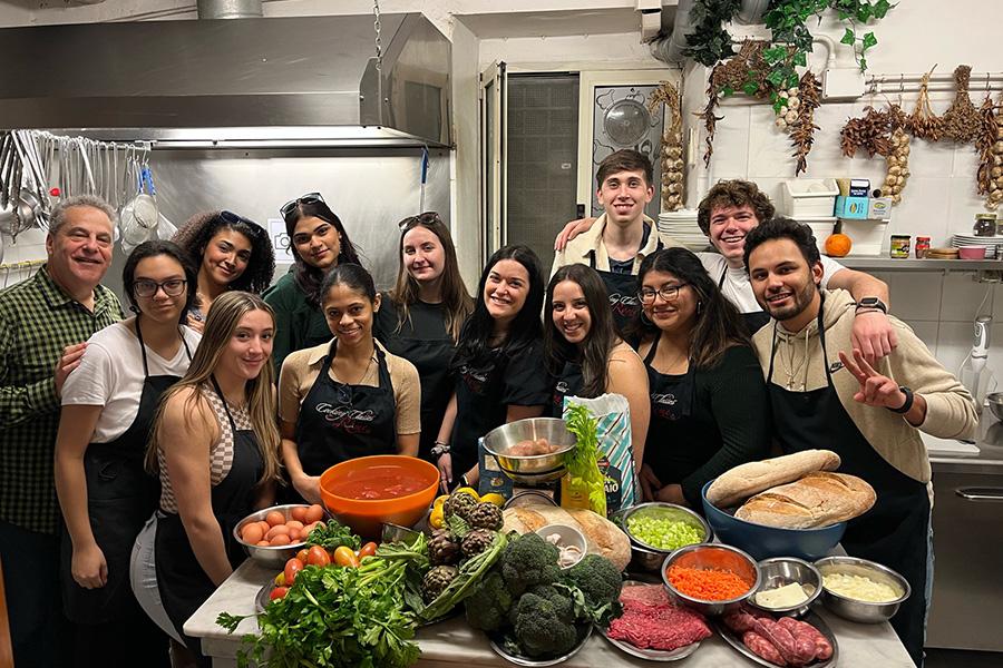 Iona group in a cooking class in Italy.