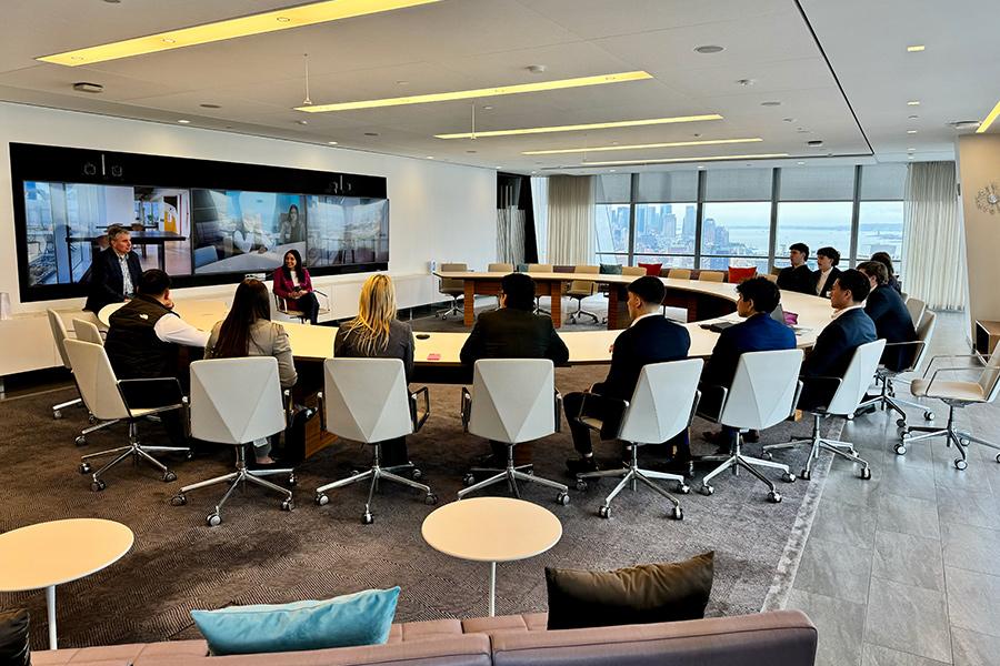 Iona students in the boardroom of L'Oreal.