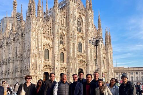 Students and faculty in front of a cathedral in Italy.