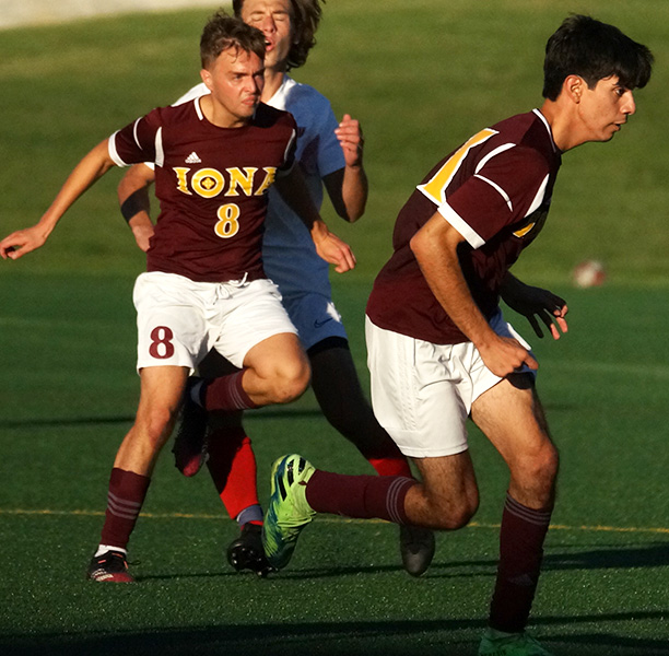 Iona men's club soccer playing offense.