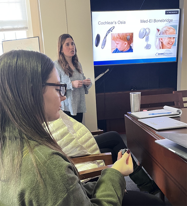 Students learn about hearing aids in an IACD class.