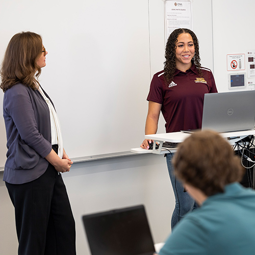 An EDU student practicing teaching.