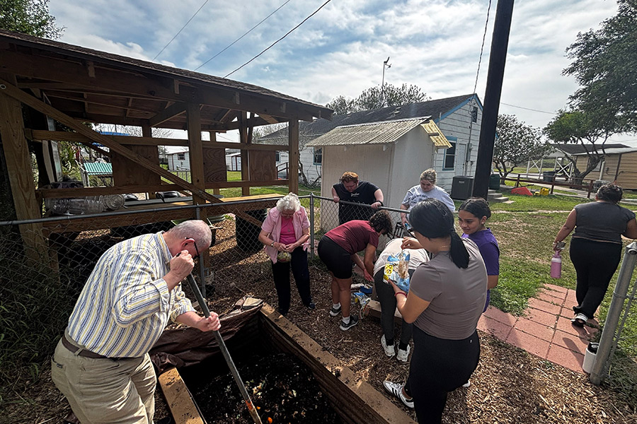 Students help out in a community garden