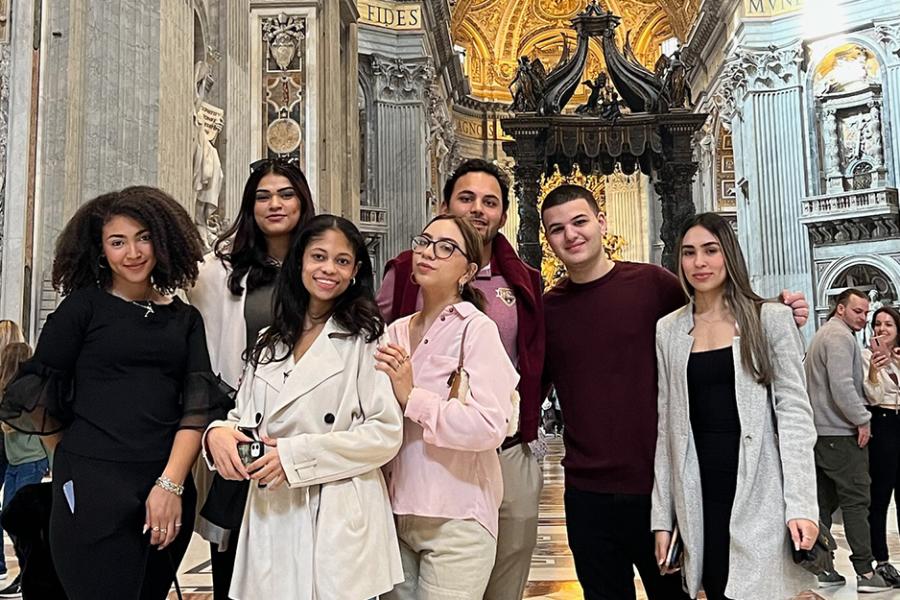 Students in Italy at a plaza. 