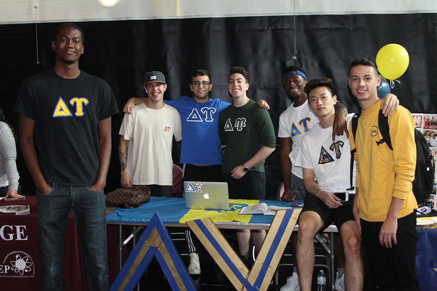 Members of Delta Upsilon recruit new members at the involvement fair.