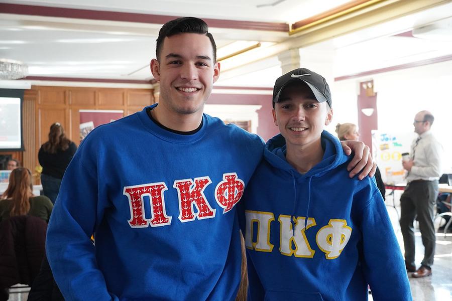 Two members of Pi Kappa Phi at the inolvement fair.