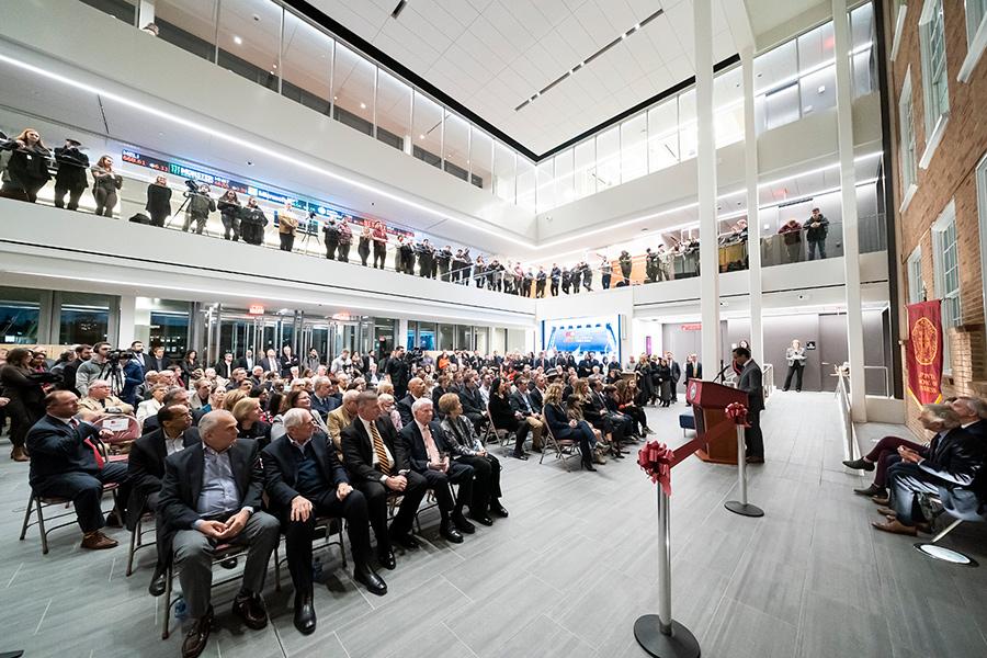 Dr. Wheeler delivers his speech to a packed atrium at the LaPenta School of Business ribbon cutting.
