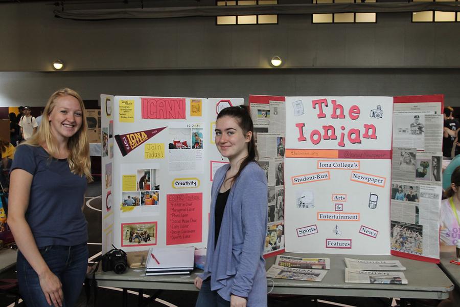 Two members of The Ionian table at the involvement fair.