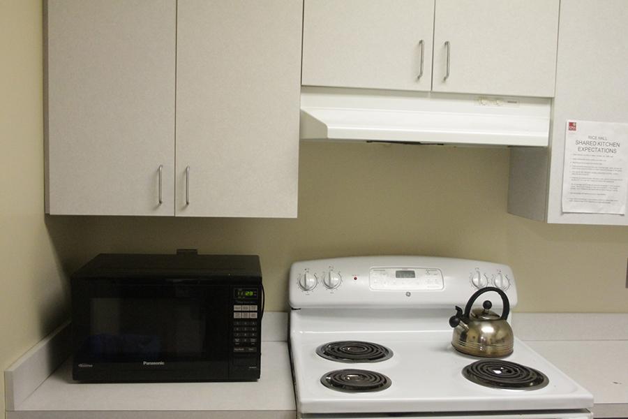 The stove and microwave area in Rice Hall.