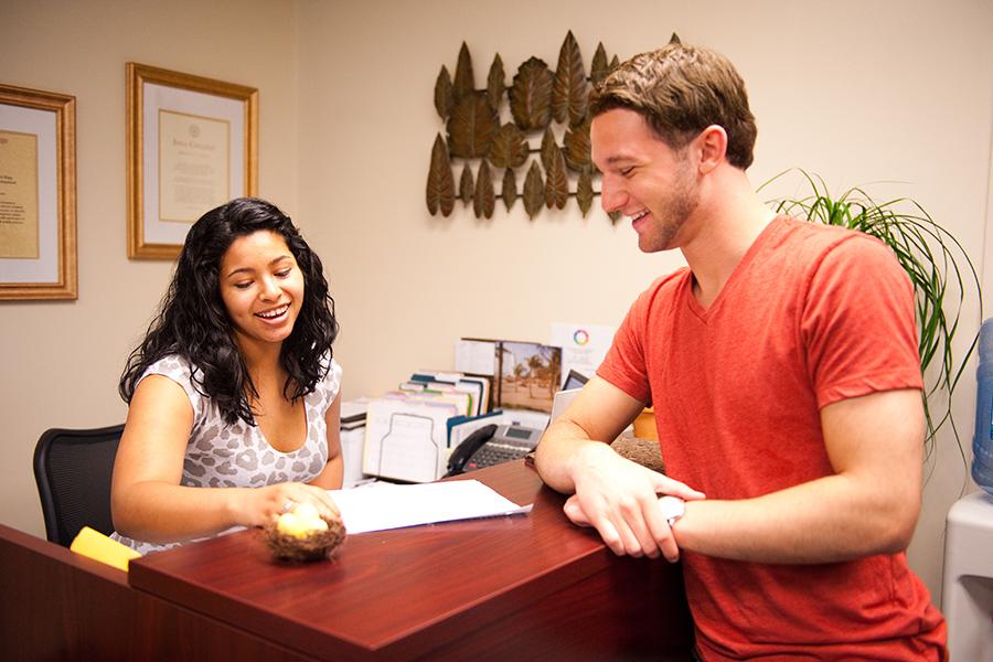 A student chats with a career coach in the career center.