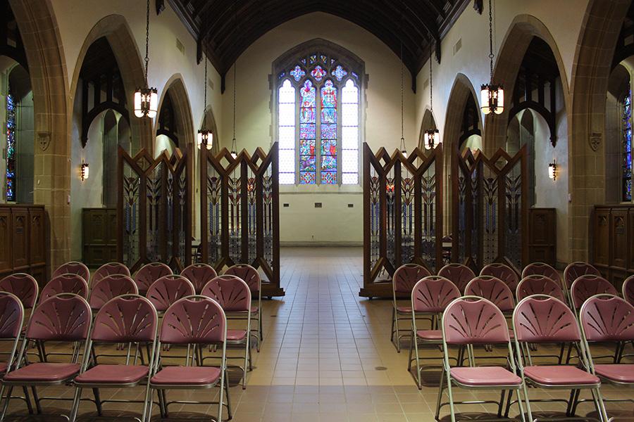 Arrigoni is set up with several rows of chairs.