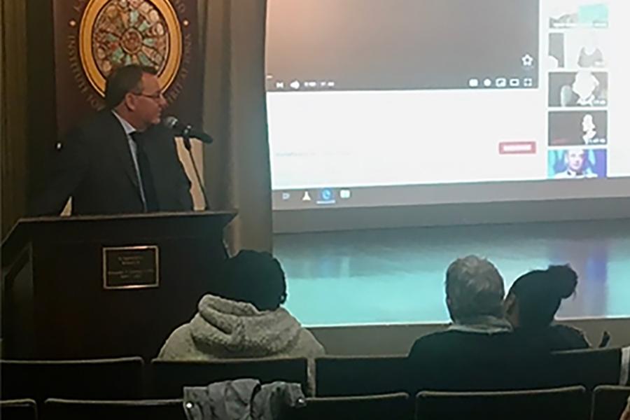 Don Mullan presents and speaks with audience in Romita Auditorium.