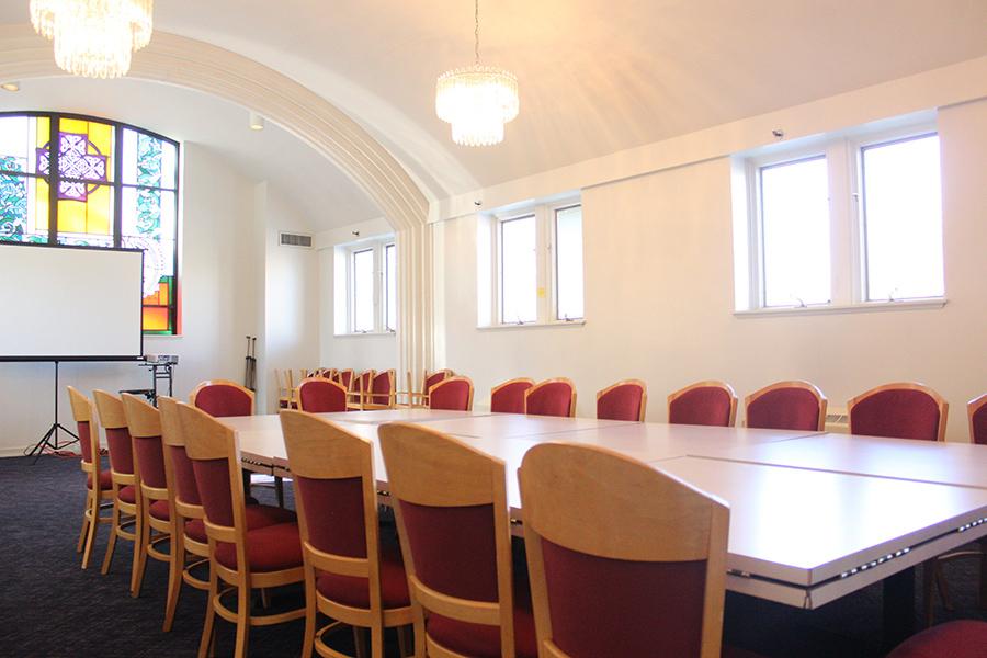 Driscoll Dining Room set up with table and chairs.
