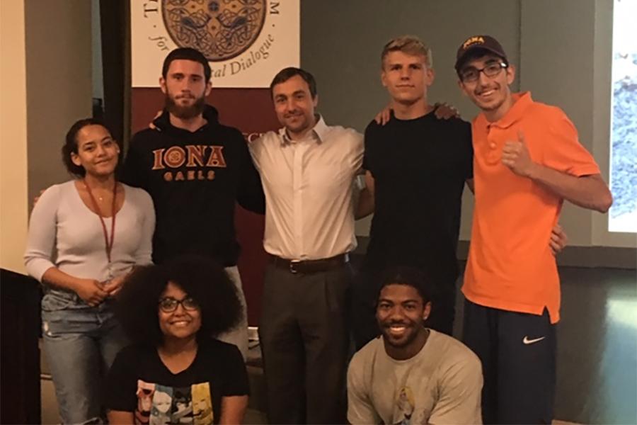 Students pose with Ken Ilgunas in Romita Auditorium.