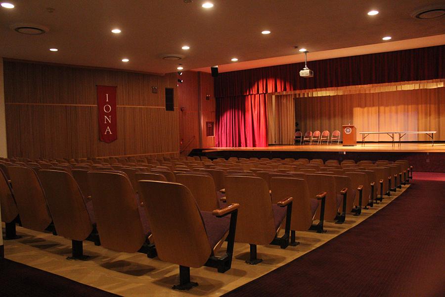Seats in Murphy Auditorium face a large stage for performances, graduations, conferences and seminars.