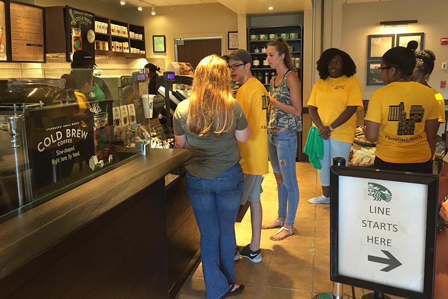 Students wait in line at Starbucks.
