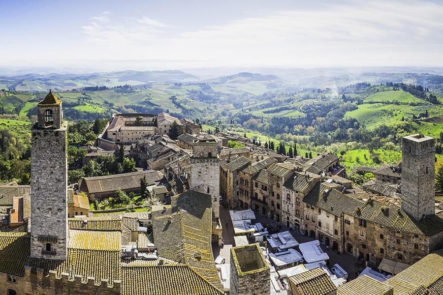 An aerial view of Tuscany, Italy on a sunny day.