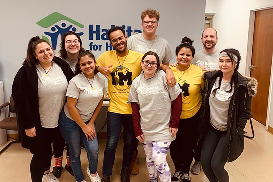 Members of an Iona Mission Trip at the Habitat for Humanity office.