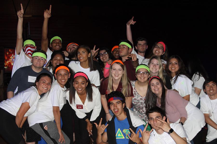 Students at orientation take a moment to pose together and celebrate