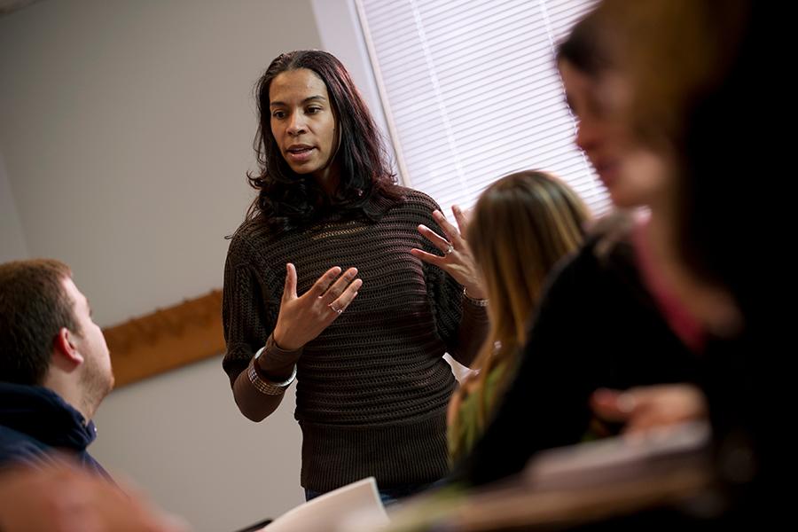 Natalie Redcross lectures during one of her classes.