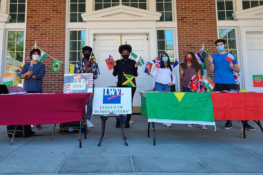 The Iona International Club sets up tables outside of Spellman to attract new members.