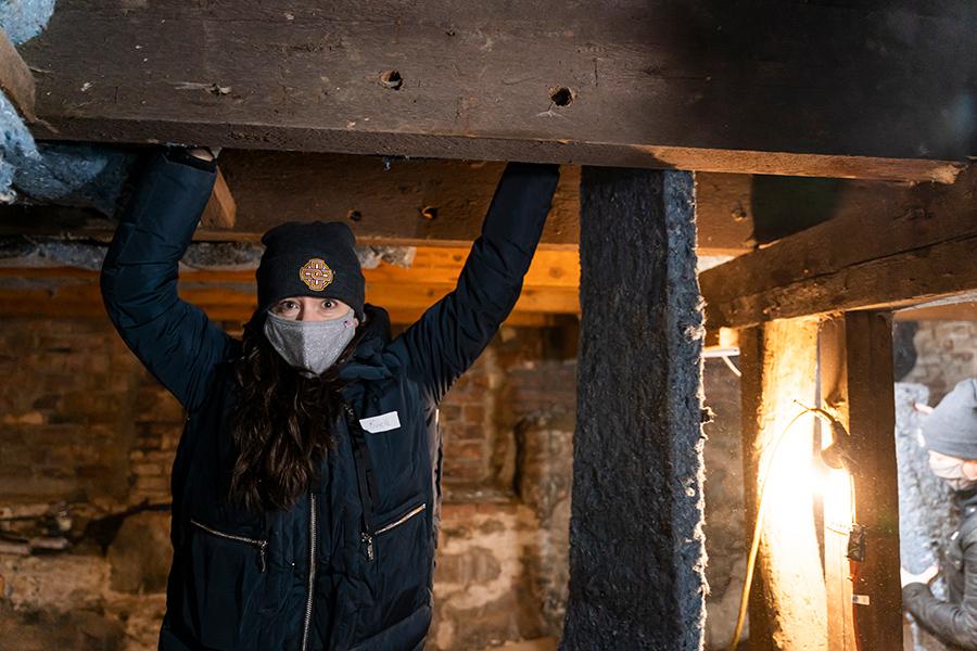 A student working in the basement of the Fuller house in Yonkers.