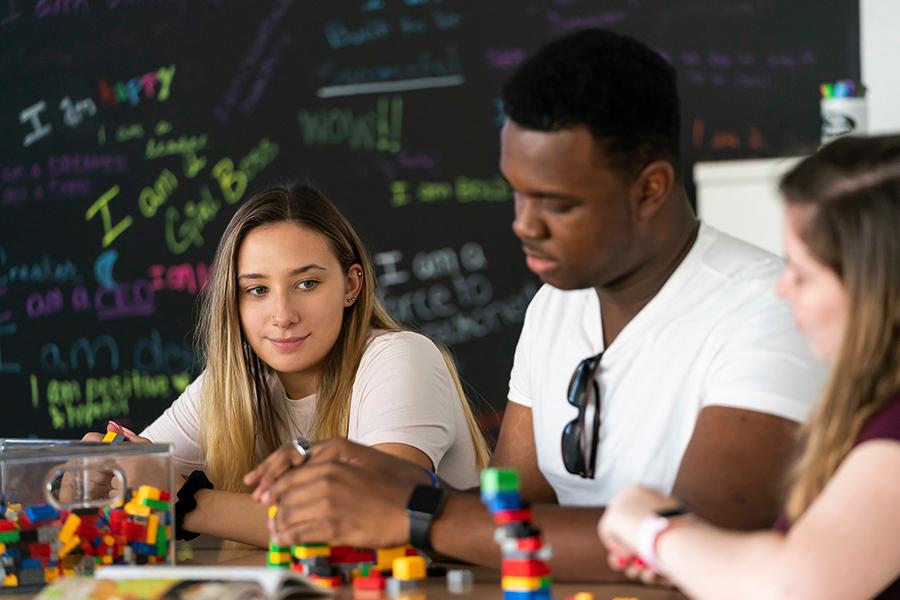 Iona University students explore the mindset of the maker culture in the Hynes Institute for Entrepreneurship & Innovation by tinkering with LEGO. 