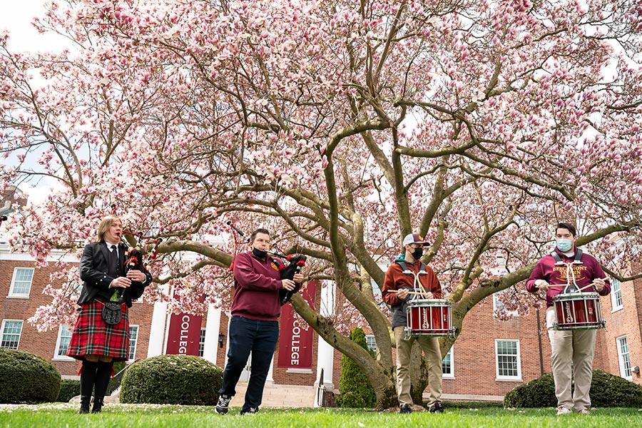 The pipers play at Hands Around Iona 2021.