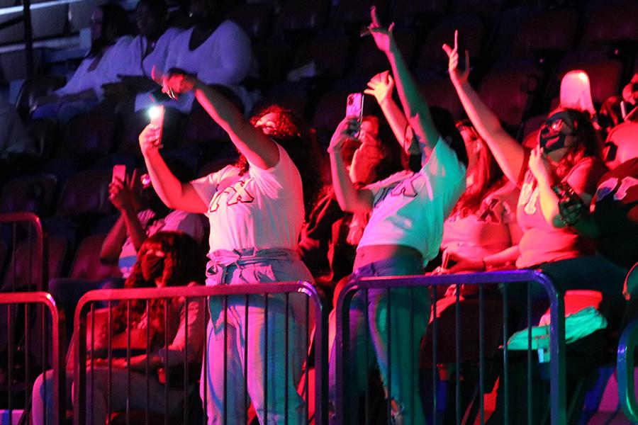 Students showing support at the fashion show.