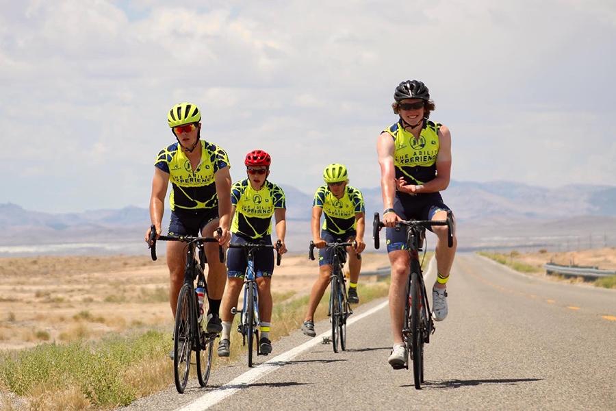 Aidan Connolly bikes with four of his teammates.