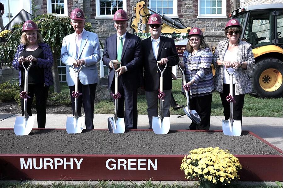 Pres. Carey and others hold shovels at the Murphy Green at the Iona Forever celebration.