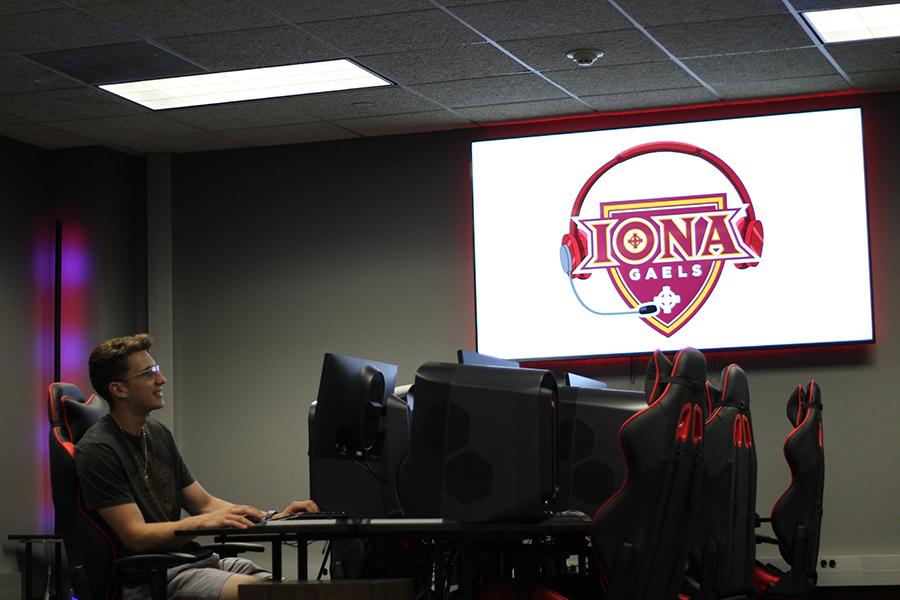 A student plays in the esports room at Iona College.