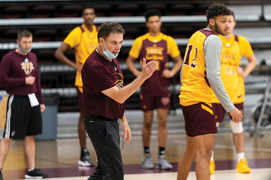 Rick Pitino coaches the team during practice.