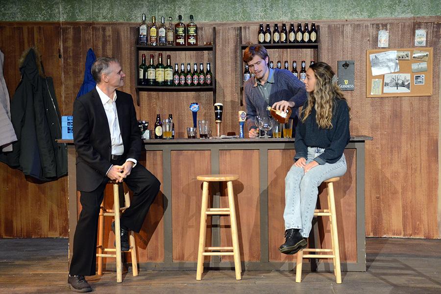 Three characters in The Weir talk at the bar.