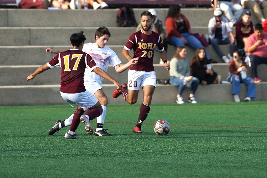 Iona club men's soccer get the ball on defense.