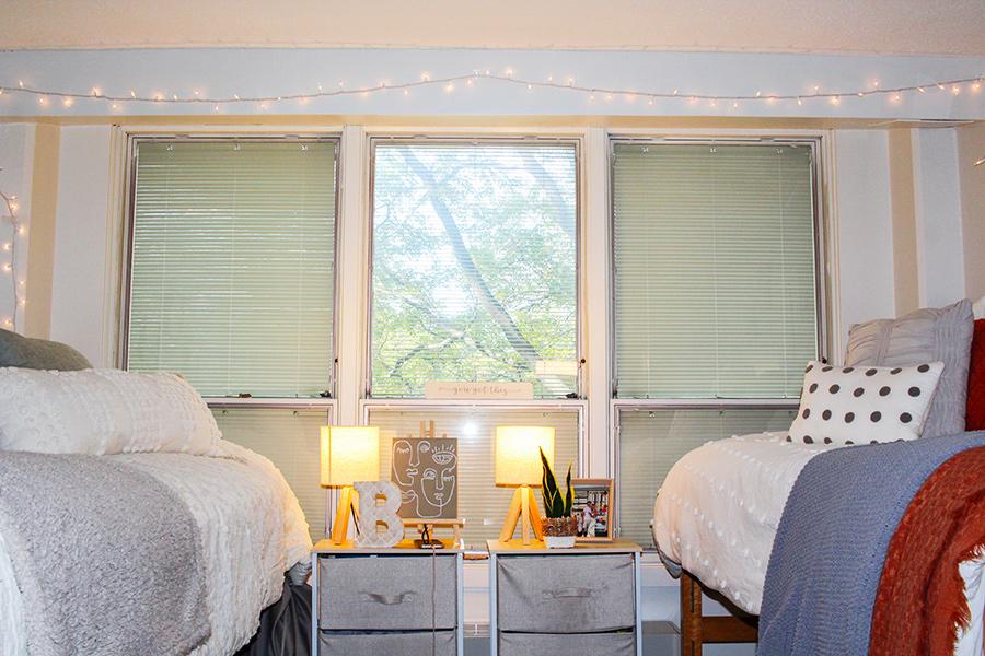 A room in Conese/Hales hall with two beds.