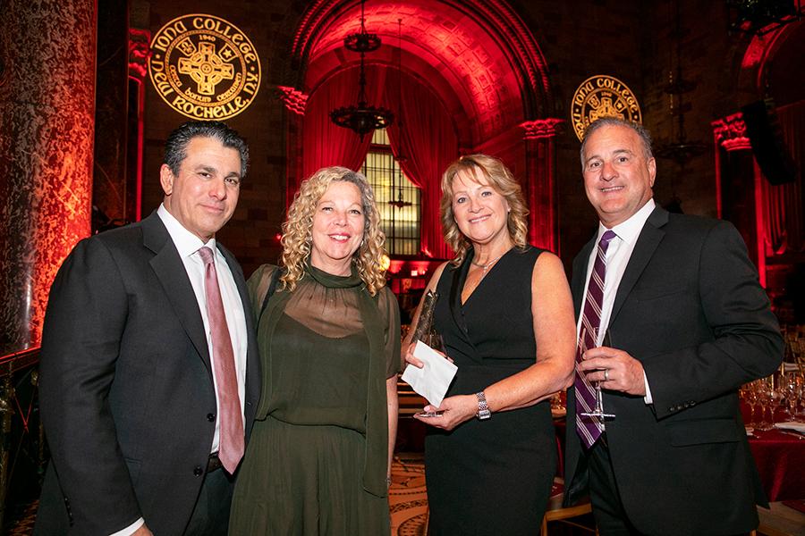Honoree Peter G. Riguardi ’83, ’16H, chairman and president, New York Tri-state Region, Jones Lang LaSalle Brokerage, Inc., and his wife, Linda Riguardi; with JoAnna Bucci and Don N. Bucci '80, managing director, Jones Lang Lasalle.