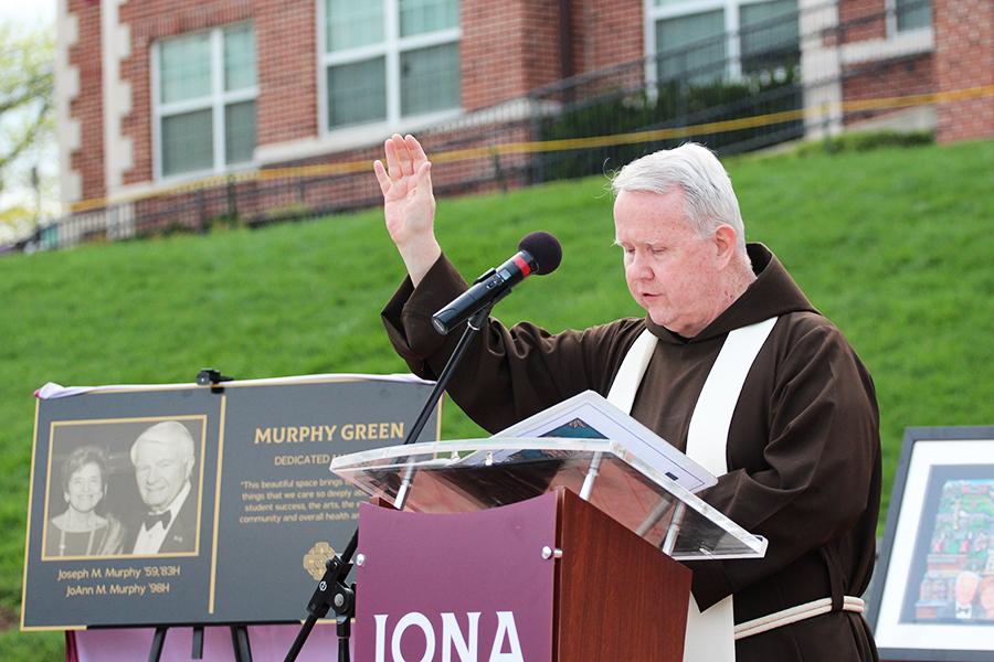 Fr. Gerard blesses the Murphy Green.