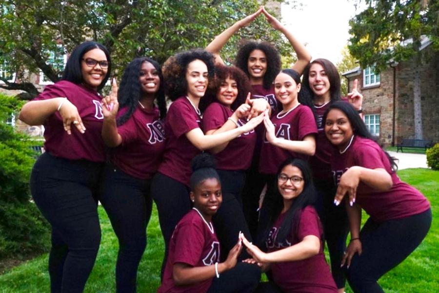 Lambda Theta Alpha 2022 members outside on campus.