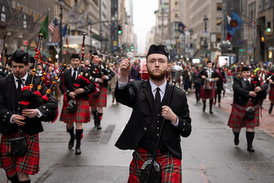 Leader of the Iona College Pipe Band marches on St. Patrick's Day.