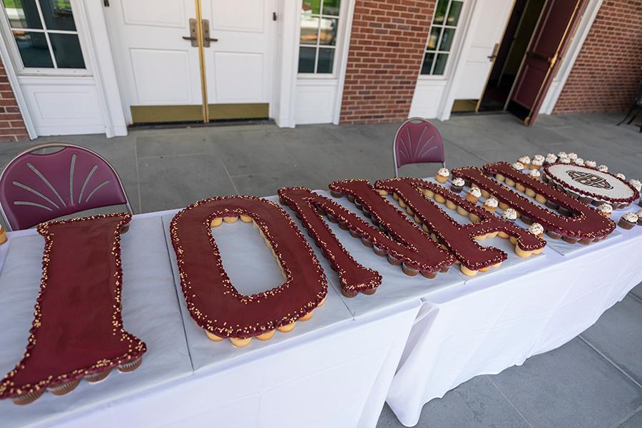 Iona U spelled out in cupcakes.