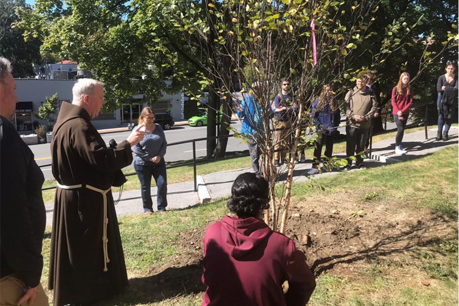 Fr. Gerald Murphy offers the Blessing of the Tree.