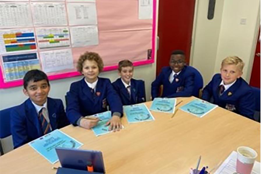 Students working at a table.