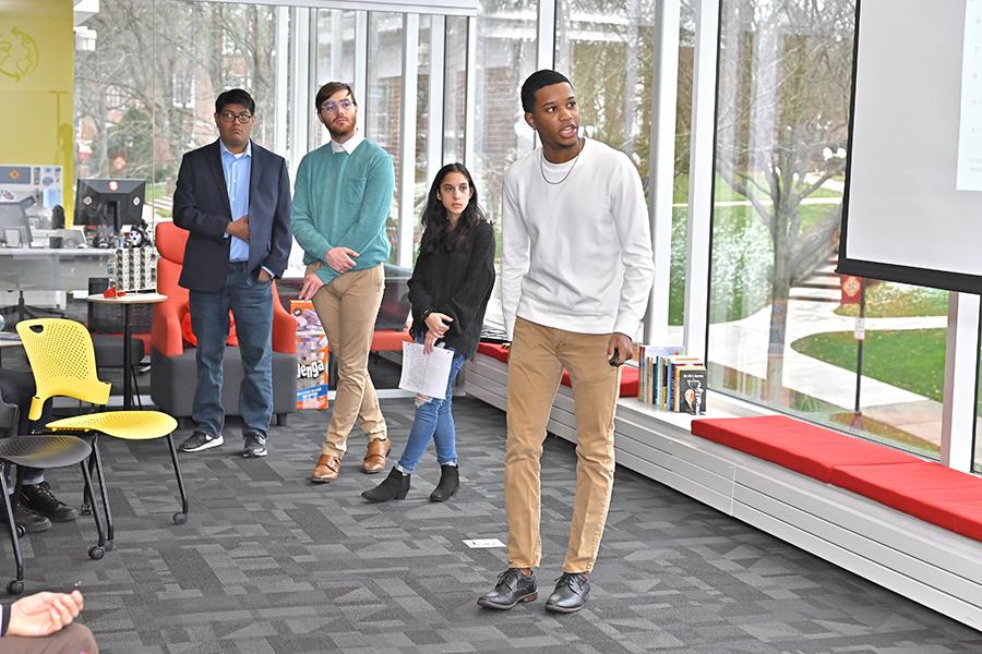 Jordan Hill, an Iona University senior, speaks during a presentation to the Yonkers Housing Authority and the Business Council of Westchester.