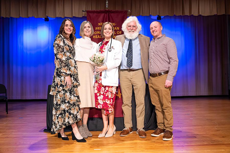 Erin Mitchell with her family at the pinning ceremony.