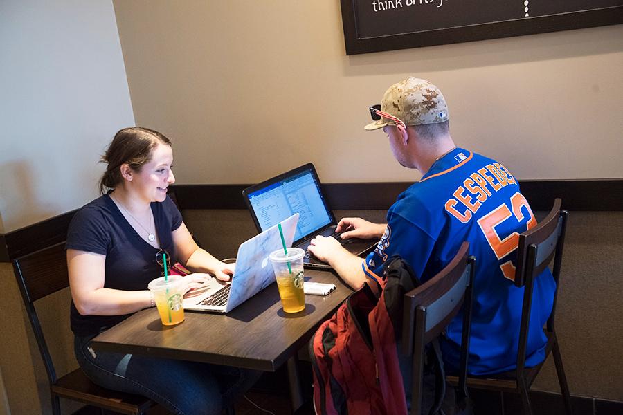 Students study in the Starbucks on campus.